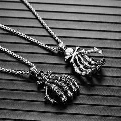 Skeleton hand pendant