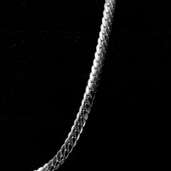 Flattened curb chain