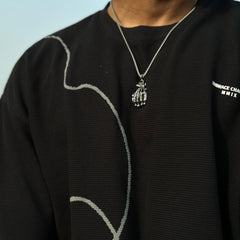 Skeleton hand pendant
