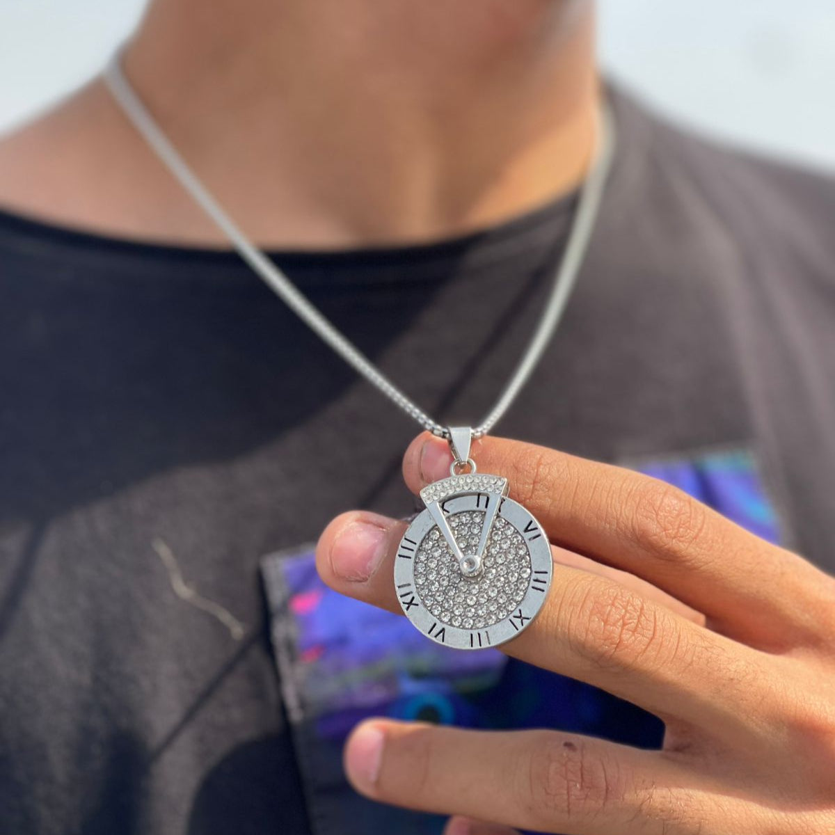 Roman numeral sweater pendant