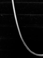 Flattened curb chain